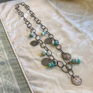 Rustic necklace adorned with Buffalo Nickels.